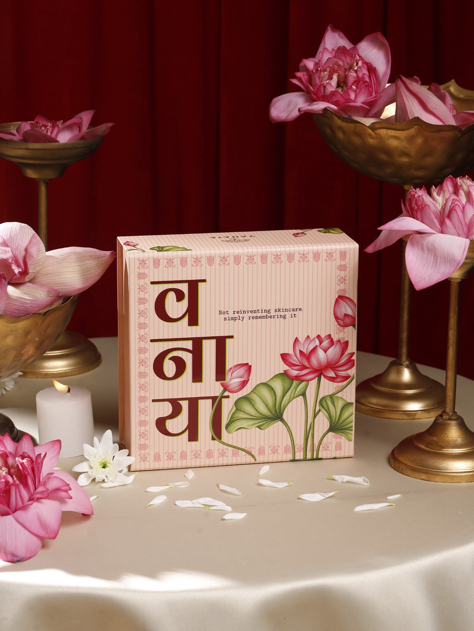 Vanaya Diwali gift box surrounded by lotus flowers and festive decor